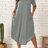 Plus size green loose fit midi dress with short sleeves, featuring an oversized casual summer style. The dress is shown in a light gray color, size 2XL, displaying a relaxed fit with a gently flaring waistline and a comfortable neck design.