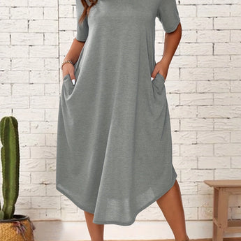 Plus size green loose fit midi dress with short sleeves, featuring an oversized casual summer style. The dress is shown in a light gray color, size 2XL, displaying a relaxed fit with a gently flaring waistline and a comfortable neck design.