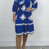 
Plus Size Dark Blue V-Neck Boho Summer Dress with Floral Embroidery featuring short sleeves and a flowing design.