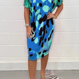 
Plus size blue satin dress featuring a leopard print design, styled for summer parties. The dress includes short sleeves and a flattering neckline, suitable for a chic and stylish look.