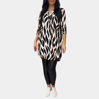 Plus size zebra print V-neck tunic with long sleeves and a high-low hem in a white color, size 3XL.
