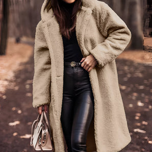Plush beige faux fur winter coat worn by a woman with stylish sunglasses, showcasing fashionable winter outerwear in an XL size.