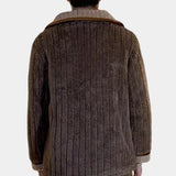 Plush teddy bear jacket for women made of warm sherpa fleece, featuring a grey and beige woolen pattern, a collar, and long sleeves.