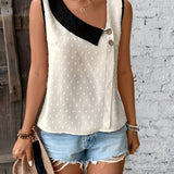 Women's polka dot contrast collar sleeveless summer blouse with chic fashion design.