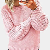 Women's lavender pullover sweater in a chunky cable knit design with long sleeves and a round neckline, shown in a soft rose color in size 3XL.