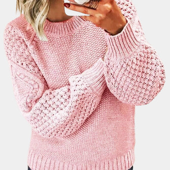 Women's lavender pullover sweater in a chunky cable knit design with long sleeves and a round neckline, shown in a soft rose color in size 3XL.