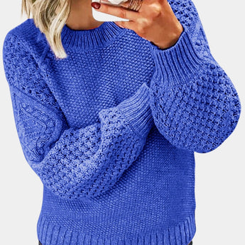Purple chunky cable knit sweater for women in lavender color, featuring long sleeves and a cozy pullover style.
