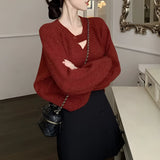 Purple V-neck Mohair Sweater displayed on a mannequin against a neutral background, showcasing its cozy knit texture and fall-appropriate style.