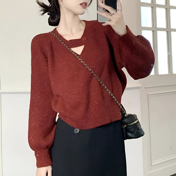 Women's red mohair v-neck sweater, shown on a mannequin, featuring long sleeves and a cozy knit texture, perfect for fall wear.