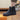 Black quilted waterproof winter boots with a cushioned sole for women, shown in size 42.