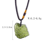 Raw Moldavite Healing Pendant with green tektite crystal on silver chain necklace, natural material jewelry.