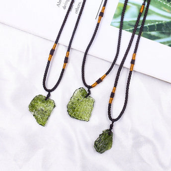 Raw Moldavite Healing Pendant in green tektite, featuring an energy crystal necklace.