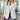 White tailored blazer for women, suitable for office and formal settings, featuring a structured design with long sleeves and a classic collar in size 2XL.