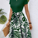 Dark green high-waisted A-line skirt with a floral pattern, suitable for women's fashion in 2XL size.