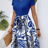 Blue floral A-line skirt with high-waisted design for women's fashion, shown in size 2XL.