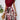 Red floral high-waisted A-line skirt worn by a woman, showcasing vibrant burgundian color, styled with a complementary top, accessorized with a watch and carrying a bag.