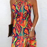Red leopard print asymmetrical party dress featuring a bold sleeveless design, shown in orange, size XL, highlighting the shoulder, arm, waist, and thigh areas.