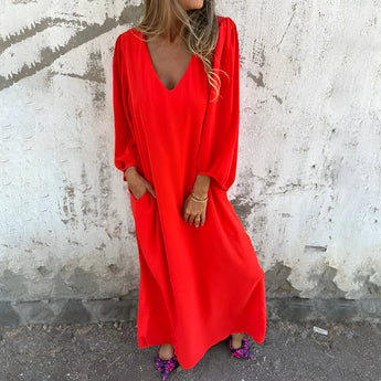 Elegant orange-red maxi dress with a V-neck and long sleeves, featuring a loose fit designed for a comfortable and stylish appearance in size 3XL.