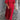 
A red maxi dress with puff sleeves and a square neck, featuring studded pockets. The dress is showcased in a 5XL size.