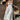 Green midi dress with spaghetti straps, vintage-style tea dress design, displayed on a mannequin against a plain background.