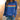 Red multicolor striped crewneck sweatshirt paired with blue jeans, showcasing casual autumn fashion.