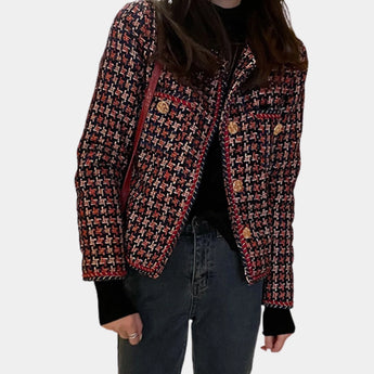 Red and navy fringed women's tweed jacket showcasing a chic designer style with a tailored fit, featuring a structured collar, long sleeves, and a form-flattering silhouette.