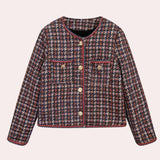 Red and navy fringed women's tweed jacket featuring a chic designer style, with long sleeves, a stylish collar, and detailed patterning in shades of magenta and electric blue.
