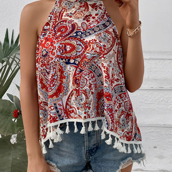 Red Paisley Halter Top with Tassel Trim modeled on a mannequin, showcasing the boho style ideal for summer festivals; features a vibrant red paisley pattern, halter neckline, and tassel embellishments, available in size XL.
