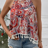 Red paisley halter top with tassel trim for boho summer festival wear, featuring a sleeveless design and a tie-neck detail.