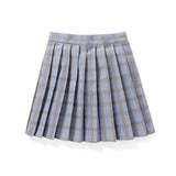 Plaid pleated tartan skirt in a purple color, designed in a preppy schoolgirl mini kilt style.
