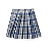 Red plaid pleated tartan skirt with a preppy schoolgirl style, featuring a mini kilt design.