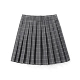 Red plaid pleated tartan skirt with a preppy schoolgirl style, featuring a mini kilt design with a classic checkered pattern.