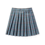 Red plaid pleated tartan skirt in a preppy schoolgirl mini kilt style, featuring a classic plaid pattern.