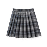 Red plaid pleated tartan mini skirt with a classic preppy schoolgirl style.