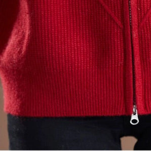 Red ribbed knit sweater with zipper featuring a warm winter design, showcasing long sleeves, a cozy high collar, and a textured fabric.