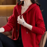 Red ribbed knit sweater with a zipper, featuring long sleeves and a cozy design, modeled by a person wearing jeans and glasses, showcasing winter fashion in size XL.