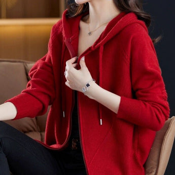 Red ribbed knit sweater with a zipper, featuring long sleeves and a cozy design, modeled by a person wearing jeans and glasses, showcasing winter fashion in size XL.