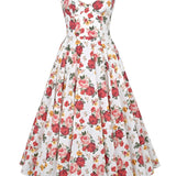 Vintage fit and flare dress with a red rose print, featuring a garden party style. The dress has short sleeves and a defined waist, showcasing a floral pattern suitable for daytime or formal occasions.