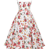 Red vintage fit and flare dress with a rose print, featuring a sleeveless design and a round neckline, suitable for garden parties.