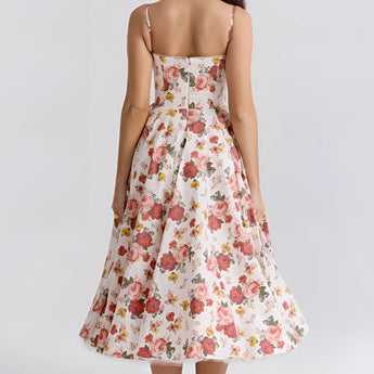 Red Rose Print Vintage Fit & Flare Dress featuring a garden party style, displayed on a mannequin with emphasis on the waist and flared hem, showcasing short sleeves and a classic round neckline.