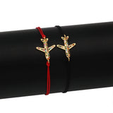 Red string bracelet with a starfish charm adorned with multicolor crystals, adjustable, beach jewelry.
