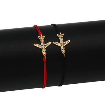 Red string bracelet with a starfish charm adorned with multicolor crystals, adjustable, beach jewelry.