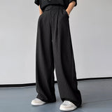 Red striped palazzo pants featuring a high waist and wide leg design, shown in a full-length view.