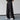 Red striped palazzo pants featuring a high waist and wide leg design, shown in a full-length view.