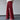 Red striped palazzo pants with a high waist and wide legs, suitable for formal wear, shown on a standing model.
