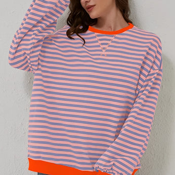 Red and white striped long sleeve blouse with a crew neck and button cuffs, shown in an XL size and styled in a casual fashion setting.