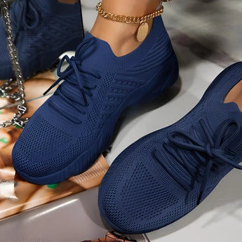 Blue women's breathable mesh sneakers with a lightweight design, featuring a mix of blue, black, grey, and white colors.