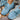 Light blue women's breathable mesh sneakers with a lightweight design, featuring a white and azure color scheme, suitable for athletic activities and walking.