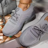 Gray women's breathable mesh sneakers, lightweight and stylish, designed for athletic activities and walking.