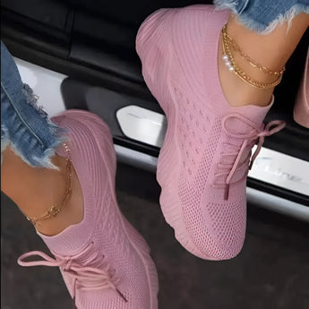 Pink women's breathable mesh sneakers with a lightweight design, shown in a size 43 against a white background.